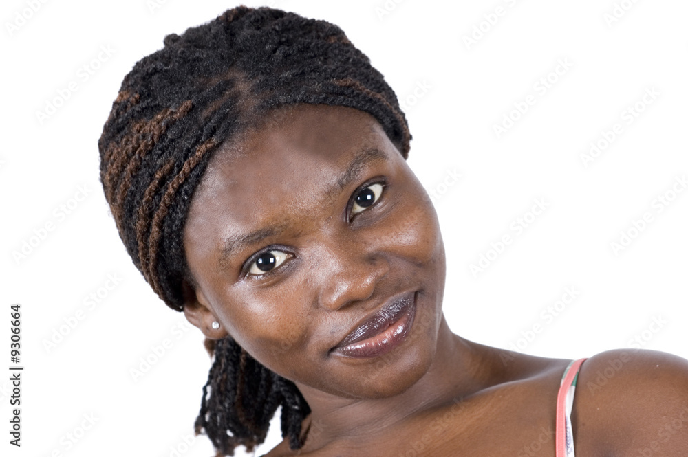 Happy, young African girl from Ghana, smiling friendly. Happy, young African girl from Ghana, smiling friendly.
