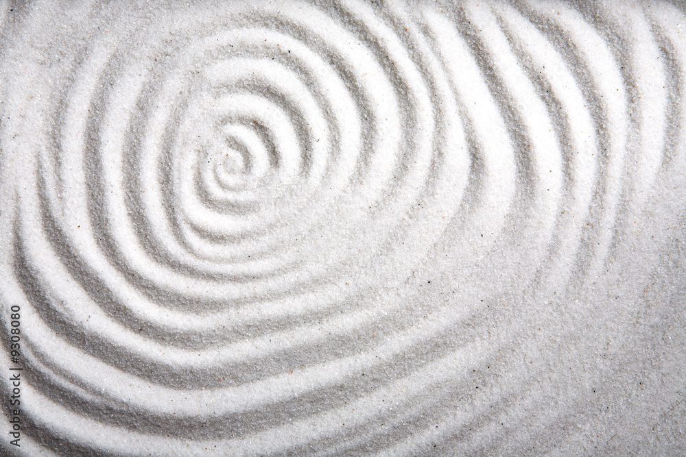 Fototapeta A background patter of a swirl in white sand