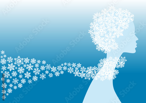 beautiful winter girl with snowflakes shawl