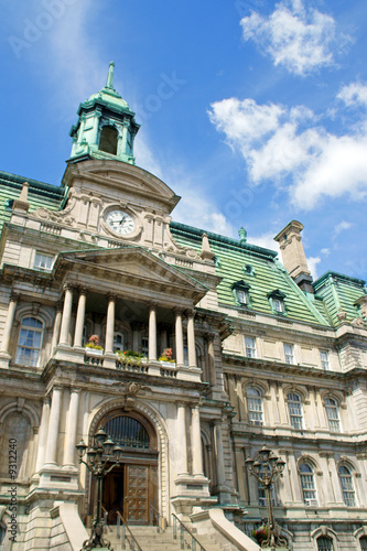 The old Montreal city hall (hotel de ville) on a cloudy day