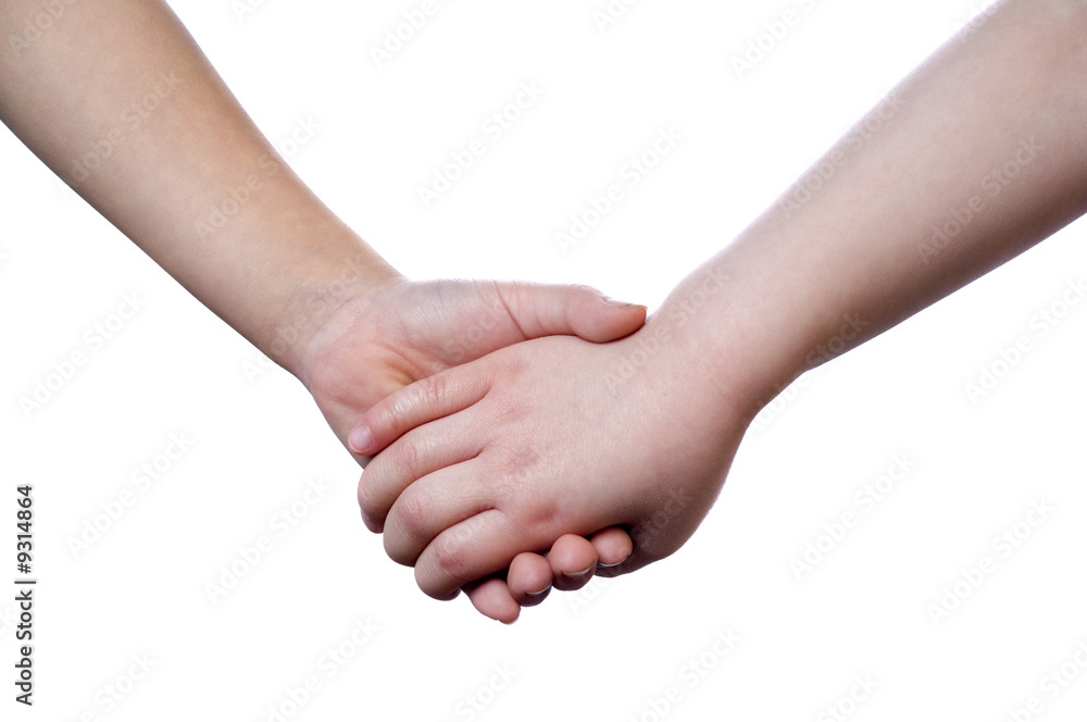 Two children are holding hands. Isolated on white