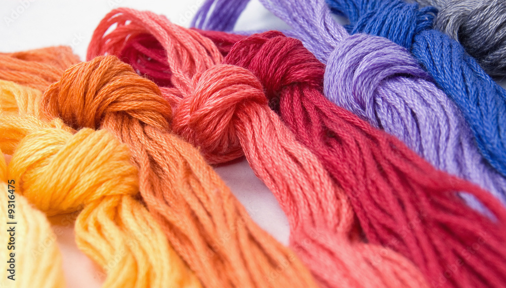 Close-up of colorful buns of threads Close-up of colorful buns of threads