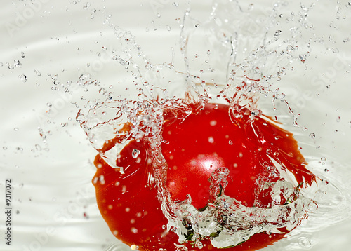 Splash caused of a fresh tomato