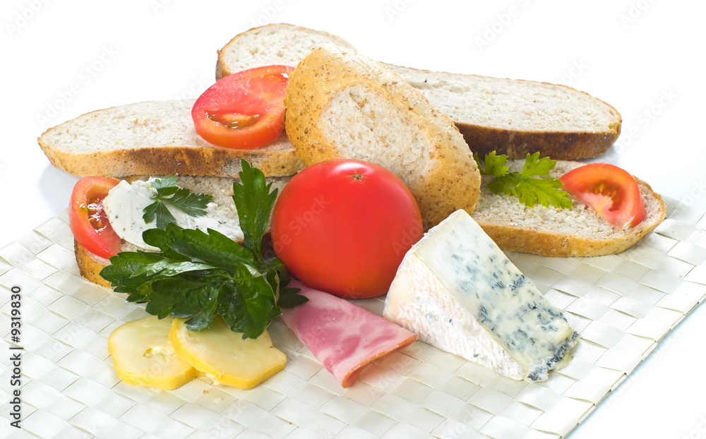 Breakfast,bread,celery,tomato and salami Breakfast,bread,celery,tomato and salami