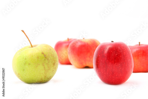 many apples in background with two apples in foregroung