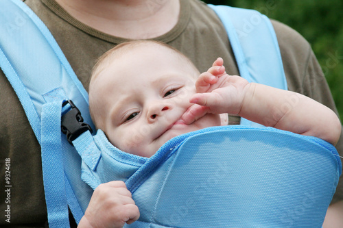 Baby sucks a finger