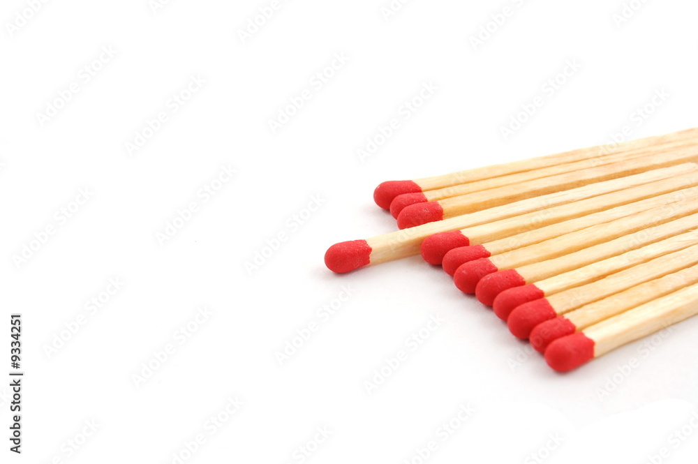 Naklejka premium Some red matches isolated on a white background.