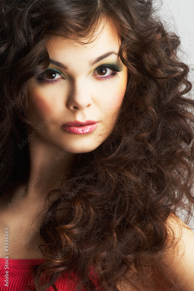 Portrait of sexy woman with beautiful make-up and curly hair Portrait of sexy woman with beautiful make-up and curly hair