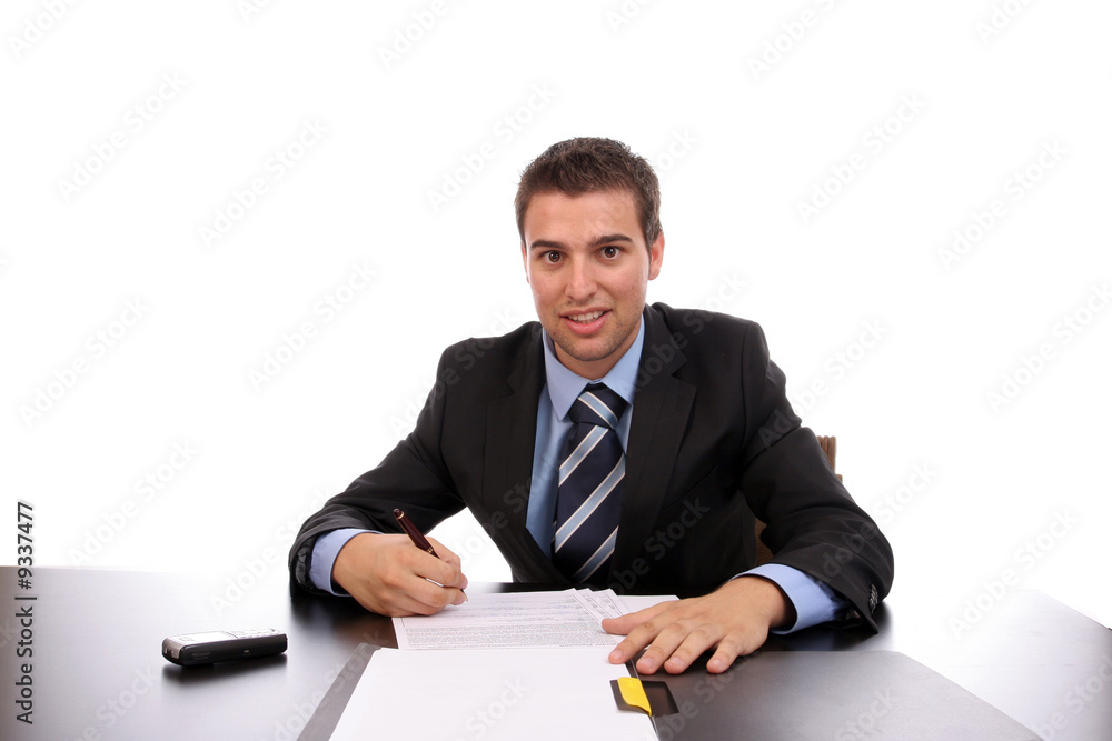young businessman at work, isolated over white young businessman at work, isolated over white