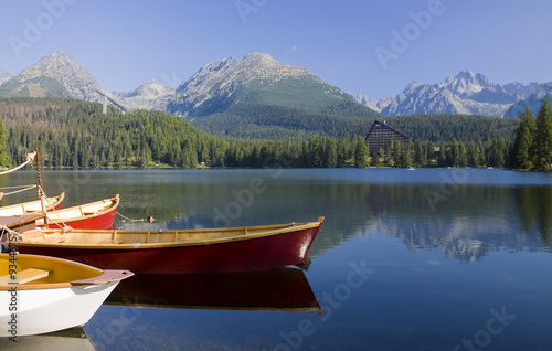 Mountain lake with boats in National Park High Tatra, Slovakia