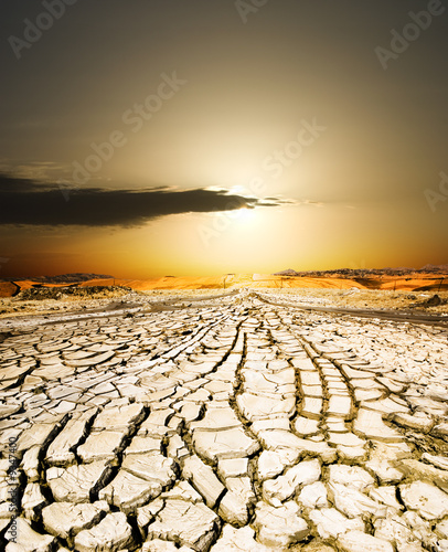 sunset on the ground dried by dryness