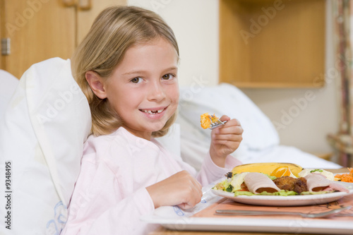 Young Girl Eating Hospital Food © Monkey Business