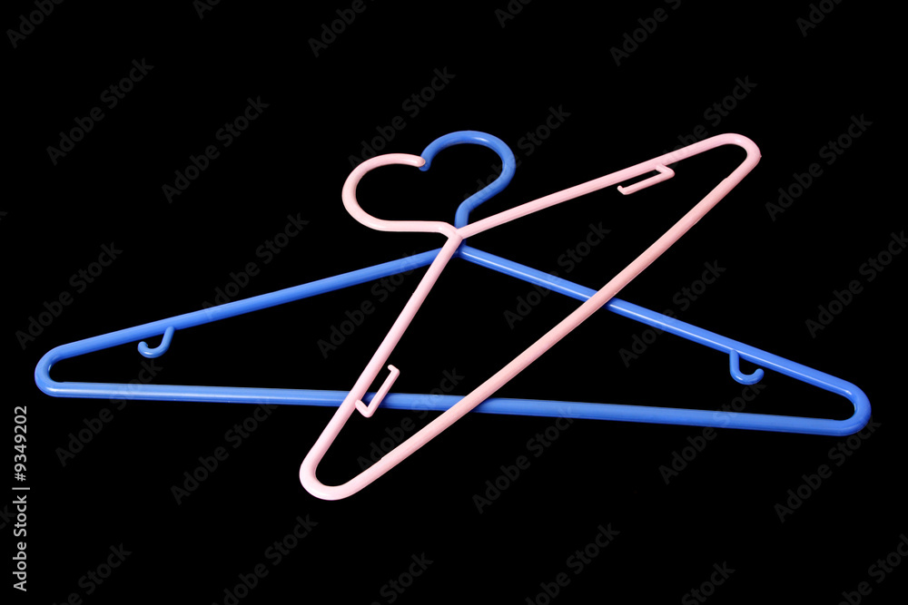 two plastic hanger, black background two plastic hanger, black background