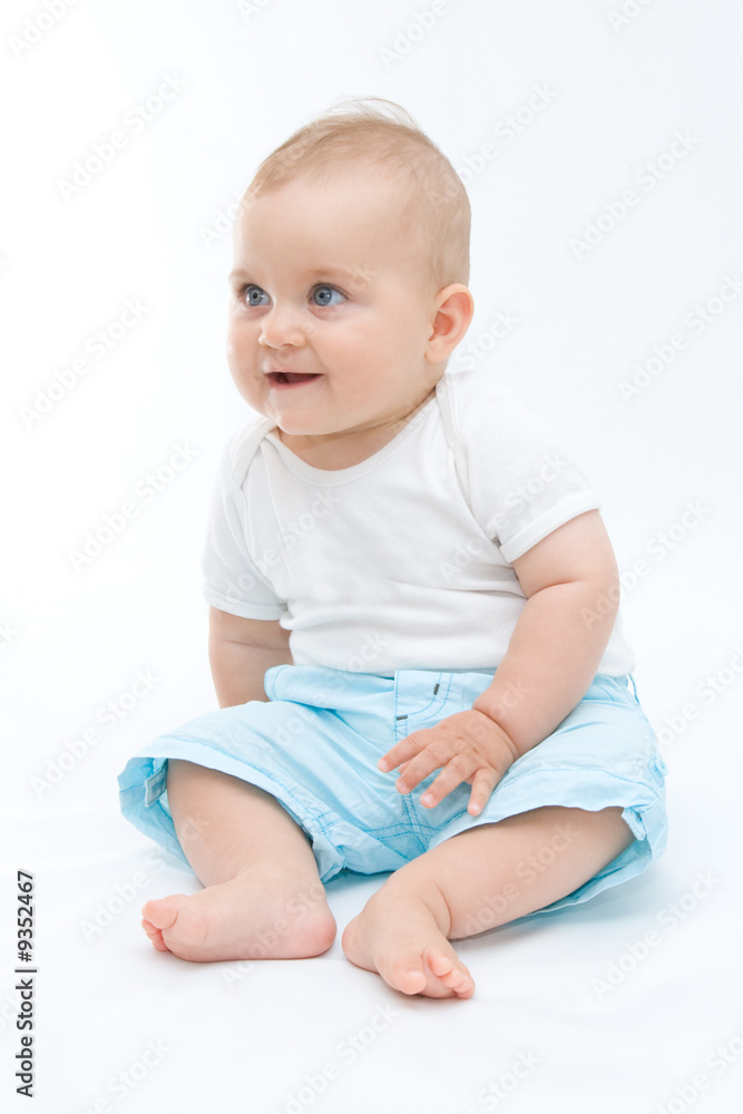 cute laughing baby boy sitting on white background cute laughing baby boy sitting on white background