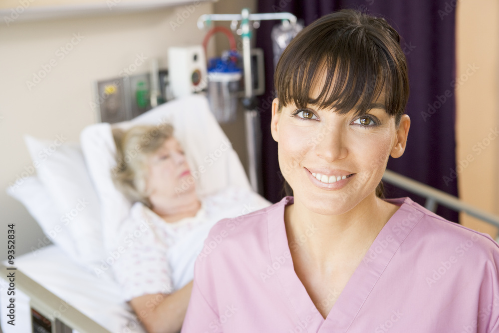 Nurse Standing In Hospital Room,Smiling Nurse Standing In Hospital Room,Smiling