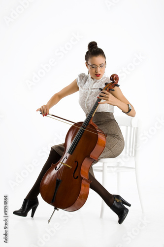 Young attractive model with violoncello