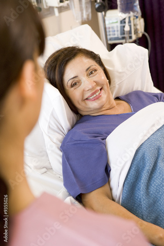 Senior Woman Lying In Hospital Bed,Smiling © Monkey Business
