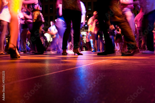 A low shot of the dance floor with people dancing