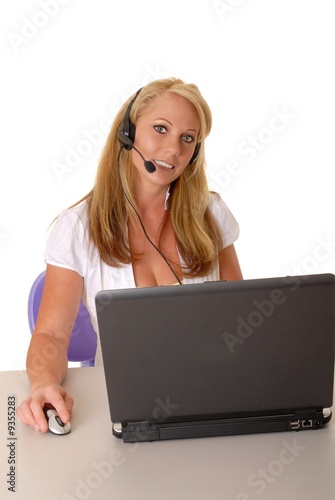 Lovely blond business woman hard at work
