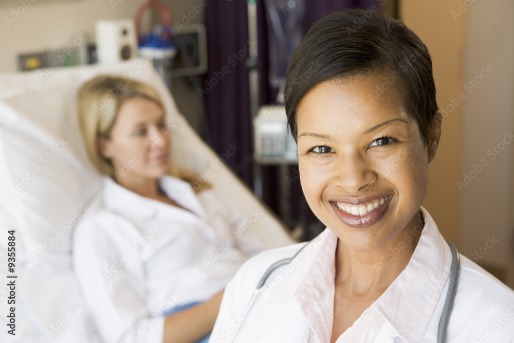 Nurse Standing In Patients Room Nurse Standing In Patients Room