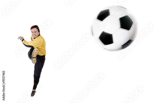 Young goalkeeper in action. Full isolated studio picture © PictureArt