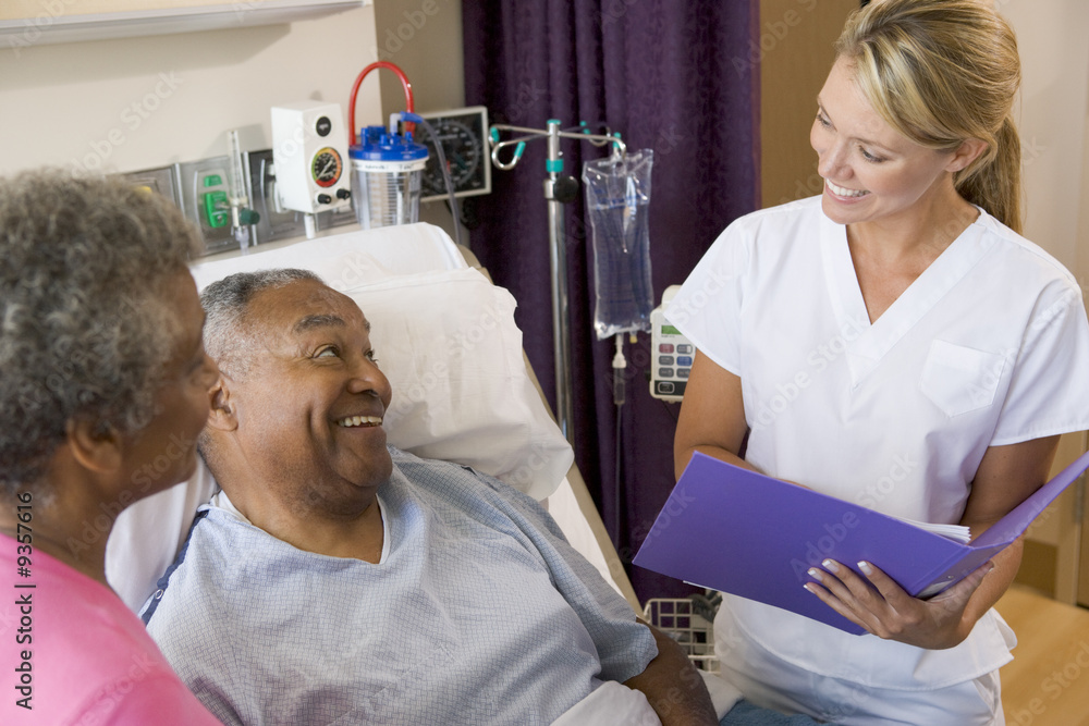 Doctor Making Notes About Patient Doctor Making Notes About Patient
