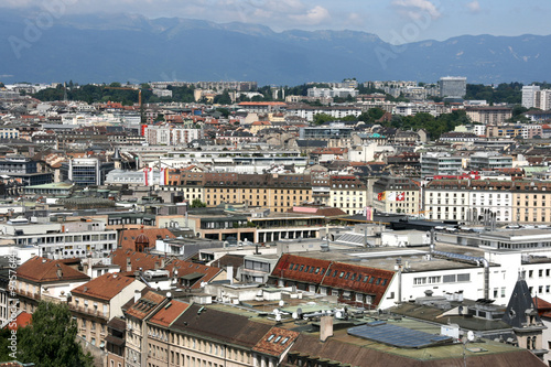Cityscape of Geneva, Switzerland. Alps in background.