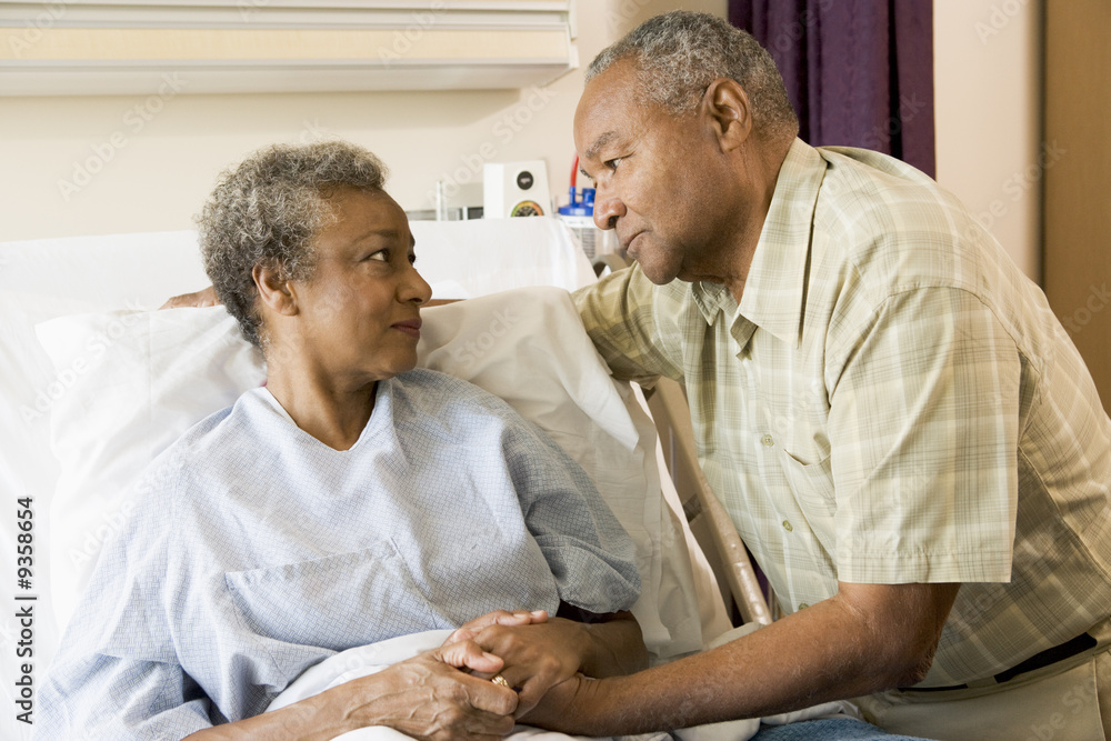 Fototapeta premium Senior Couple Standing In Hospital Together