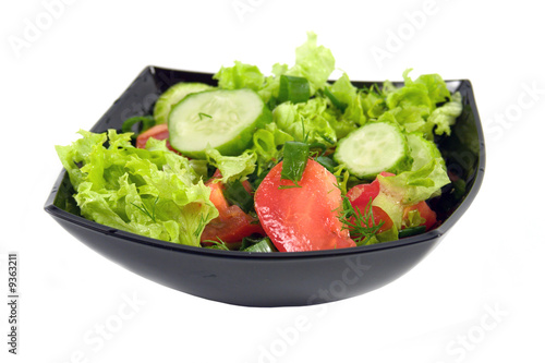 Fresh vegetables salad on a white background