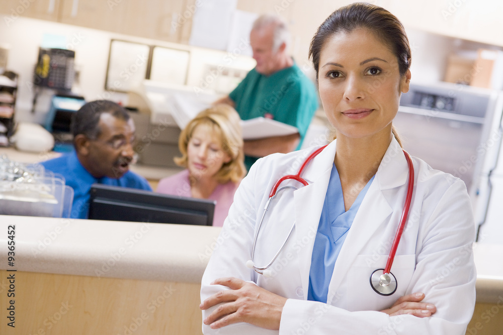 Doctors And Nurses At The Reception Area Of A Hospital Doctors And Nurses At The Reception Area Of A Hospital