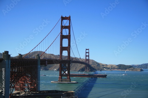 ship under the golden gate bridge