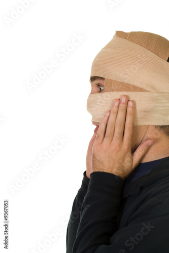 A man wearing tensor bandages after receiving surgery photo