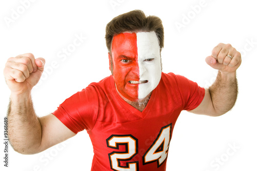 Cuadro en lienzo Angry sports fan with a painted face, raising his fists