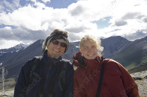 father and daughter on top of the mountains © amelie