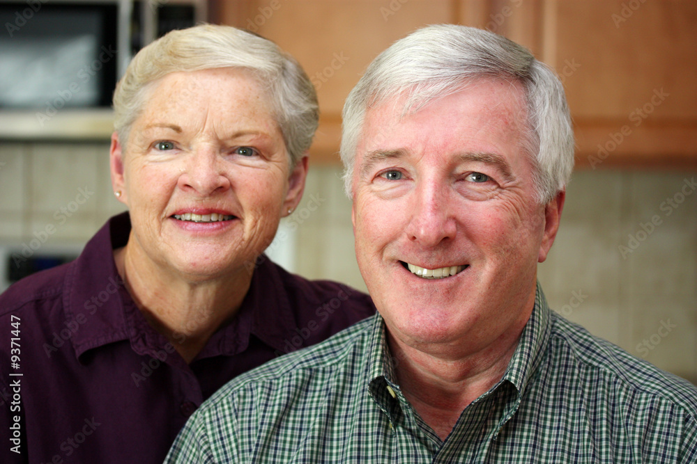 Happy Senior Couple Together In Their Home Happy Senior Couple Together In Their Home