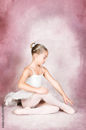 Young dancer wearing a tutu and tiara