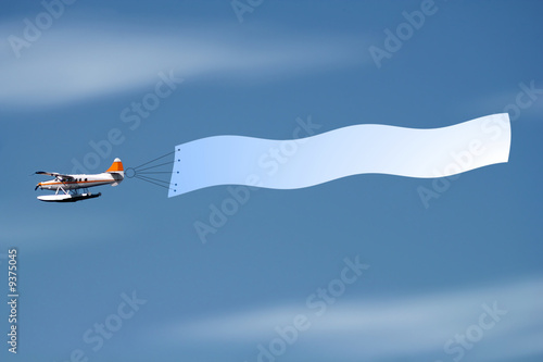 A little airplane with banner