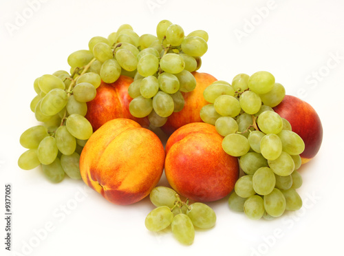 Bright  ripe fruit - grapes and nectarines. Object over white