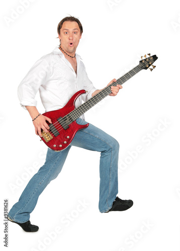 Man with guitar in move
