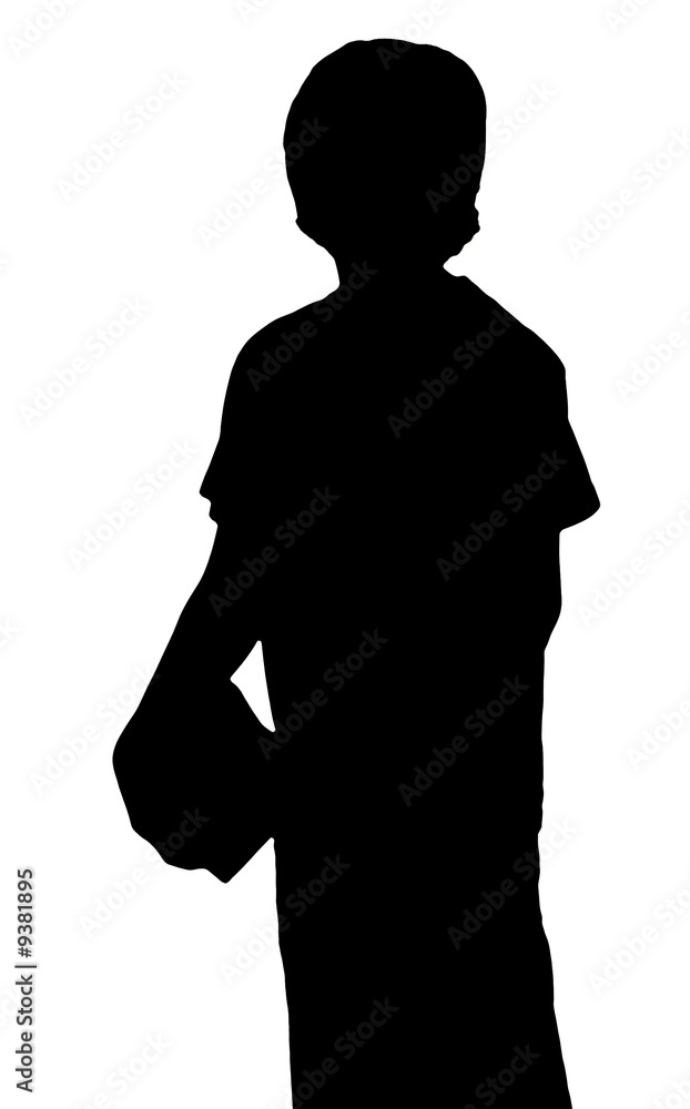 silhouette of a young adolescent boy carrying books