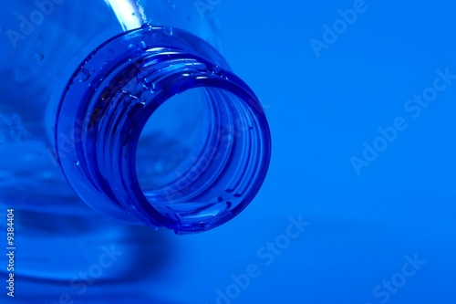 Closeup of an empty, open water bottle