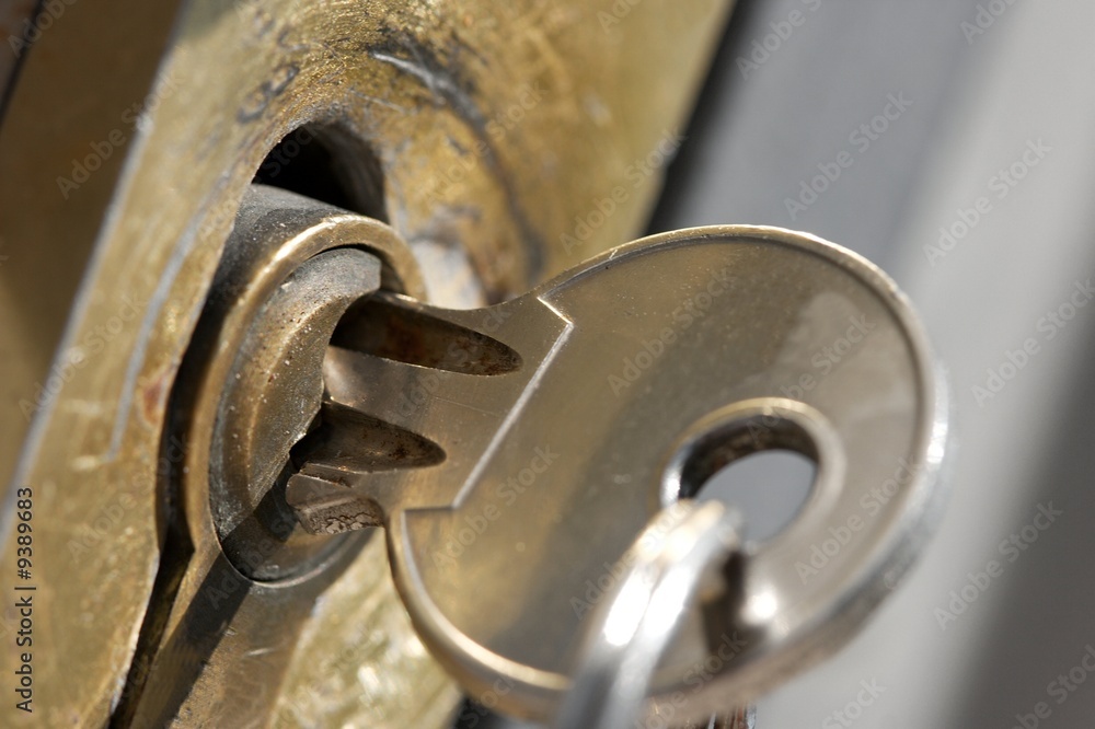 Closeup of a key in the lock Closeup of a key in the lock