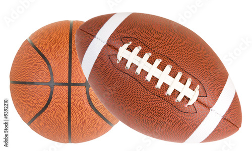 Close-up of a basketball and a football