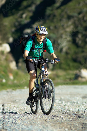 Mountain biker on country road