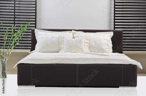 A view of a modern bed room
