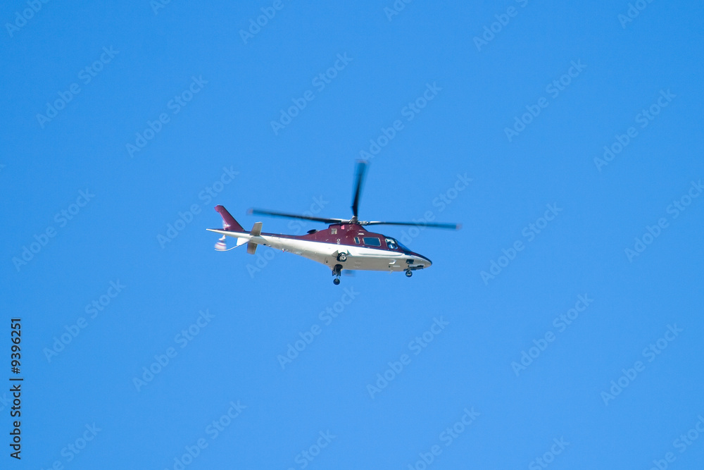 Obraz premium Helicopter on a background of the clear sky