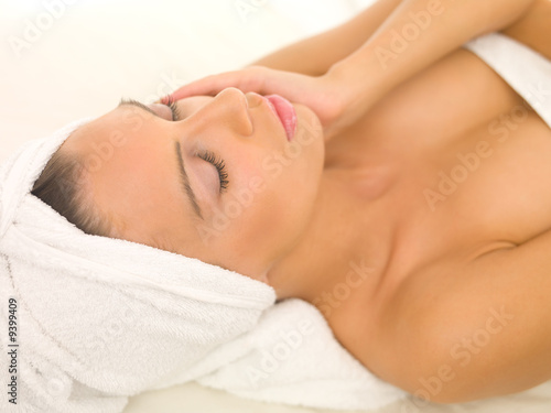 Portrait of beautiful woman during spa treatment