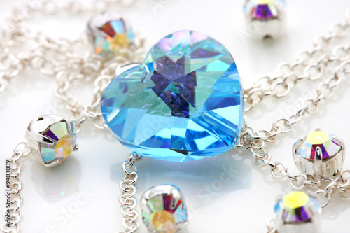 Blue love shape swarovski with silver chain and jewelry.
