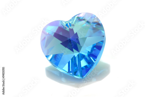 Blue love shape swarovski isolated on white background.