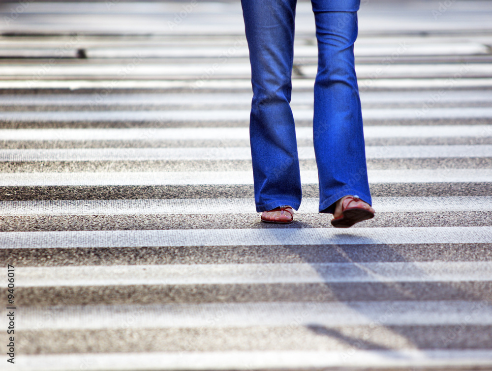 A woman on pedestrian crossing A woman on pedestrian crossing